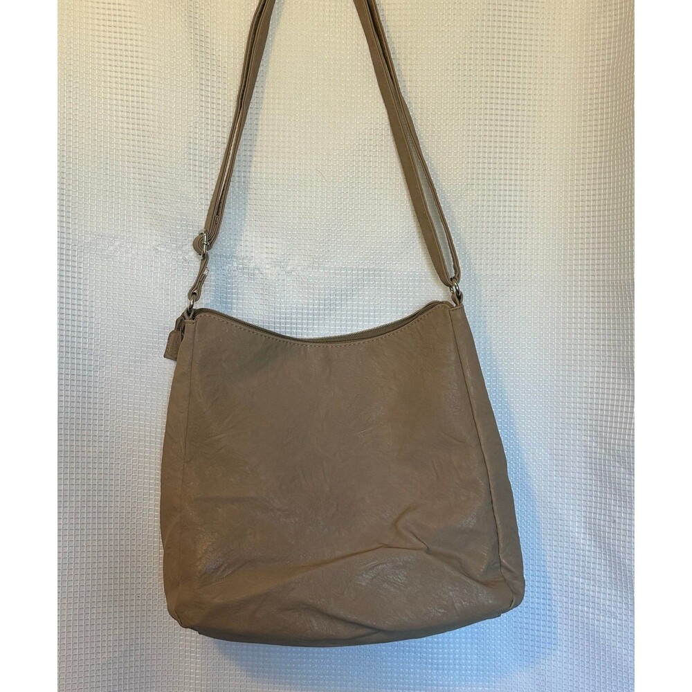 MultiSac brand taupe crossbody purse is a stylish and practical accessory for wo